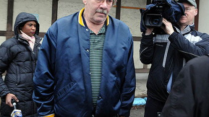 The Rev. Bartley A. Sorensen, the priest charged with viewing child porn, leaves District Judge Thomas Caulfield's office in Forest Hills Tuesday morning after waiving his hearing.
