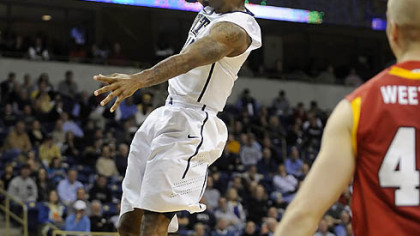 Pitts' J.J. Moore dunks the ball against VMI.