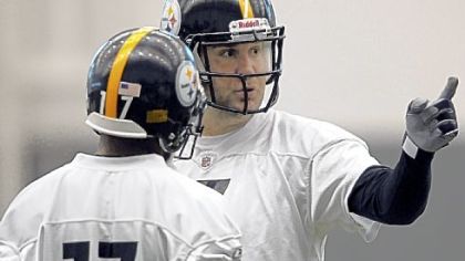 Ben Roethlisberger and Mike Wallace discuss something as the Steelers began preparations for Sunday's game in Cleveland.