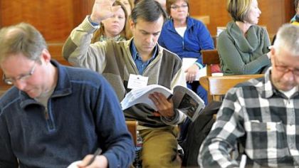 Nicholas Seitanakis of Upper St. Clair asks a question in the Local Government Academy's budget and finance class.