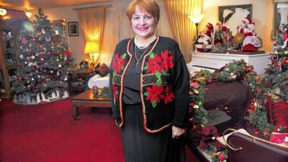 Carol Vicini, with her year-round Christmas decorations in her home in Whitehall.