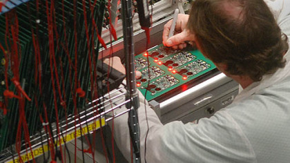 A printed circuit board is checked after assembly at Industrial Scientific Corp. The company manufactures gas detection monitors.