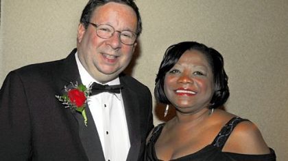 David Cohen and Urban League CEO Esther Bush.