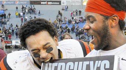 Clairton's Dakota Halcomb takes a bite out of a large Hershey's bar after defeating Southern Columbia Friday in the PIAA Class A championship in Hershey, Pa.