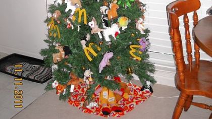 Marie Scholz, 88, of McDonald has a McDonald's theme tree up all year.