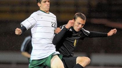Allderdice's Jon Munian, left, fights Brashear's Cody Hutchinson for the ball on Oct. 31. Munian is not worried about the Dragons' move from the City League to the WPIAL.