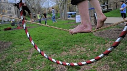 Slacklining is a balance activity similar to tightrope walking, but on a line that is loosely strung rather than tight.