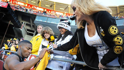 Steelers Ryan Clark signs autographs before game against the 49ers Monday night at Candlestick Park.