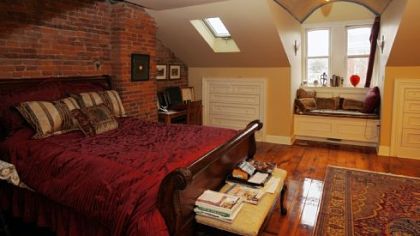 The master bedroom features skylights and built-in dressers.