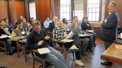 Sewickley Borough manager Kevin Flannery, right, teaches a Local Government Academy's budget and finance class at University of Pittsburgh on Saturday.