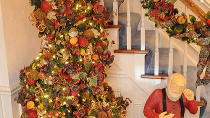 A spiral tree with glazed fruits and Santa by Celine Wilson.