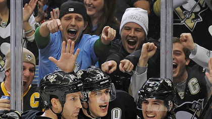 Evgeni Malkin celebrates his second goal of the first period Saturday against the Sabres at Consol Energy Center. Malkin went on to score one more goal to complete his seventh career hat trick.