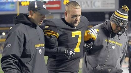 Steelers quarterback Ben Roethlisberger is helped off the field after being injured against Cleveland Dec. 8.