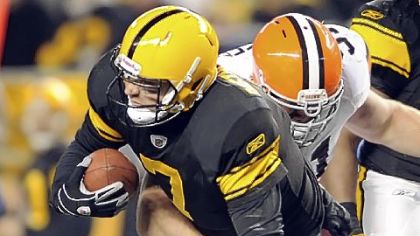 Ben Roethlisberger is sacked by the Browns' Scott Paxson in the second quarter Thursday night. Roethlisberger left the field with an injury on the play.