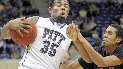 Pitt's Nasir Robinson grabs a rebound against Saint Francis' Kameron Ritter in the first half Tuesday night at Petersen Events Center.