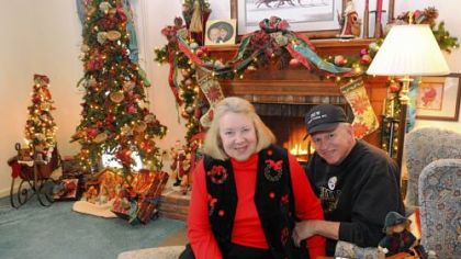 Bill and Celine Wilson have set up 11 Christmas trees at their Upper St. Clair house.