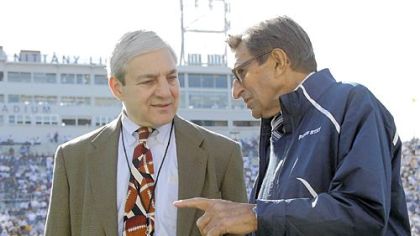 Voters surveyed in the Quinnipiac University poll said they approve of the firing of Penn State President Graham Spanier and football Coach Joe Paterno, right.