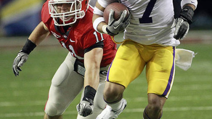 LSU's Trann Mathieu provided energy and big plays for the Tigers on defense and in the return game in the SEC championship game in Atlanta. Here, he returns a punt for a touchdown in the first half to help them recover from a 10-0 Georgia lead.