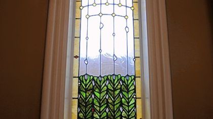 All the stained glass in the home is new and created by Stephen Schuler.