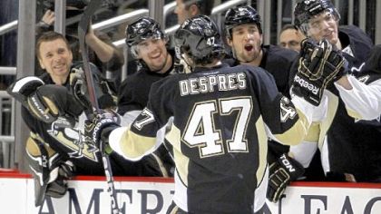 Defenseman Simon Despres celebrates his first NHL goal against the Sabres Saturday at Consol Energy Center.