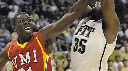 Pitts' Nasir Robinson takes a foul from VMIs' Keith Gabriel