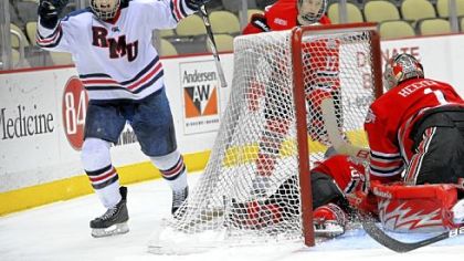 Colin South, left, celebrates his second goal of the first period Friday against Ohio State at Consol Engergy Center.