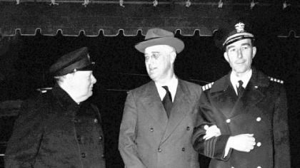 British Prime Minister Winston Churchill and President Franklin D. Roosevelt about to enter the White House on Dec. 22, 1941 for their history-making "war effort" conferences.
