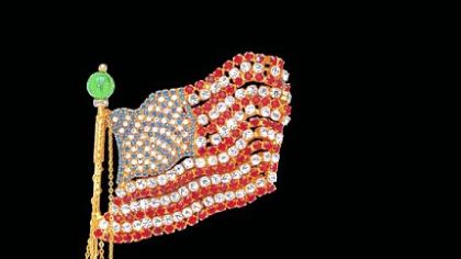 Madeleine Albright wore a jeweled flag when she met North Korean dictator Jung-Il.