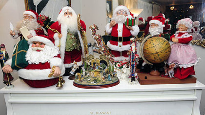 Santa Clause figures in Carol Vicini's home.
