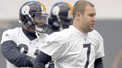 Ben Roethlisberger, wearing a brace on his left ankle, warms up before practice Wednesday at the team's South Side facilities.