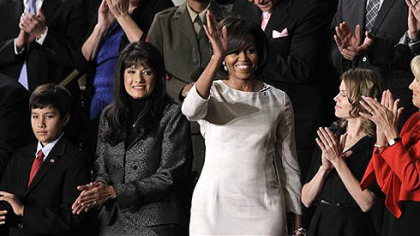 First lady Michelle Obama waves on Capitol Hill in Washington prior to the start of President Barack Obama's State of the Union address.