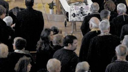 Mourners pay their last respects before the funeral of Metropolitan Nicholas at Christ the Saviour Cathedral in Johnstown on Friday.