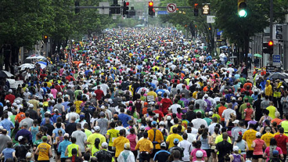 Runners race under gray skies at the 2011 Pittsburgh Marathon.