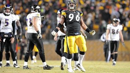 Ziggy Hood celebrates after sacking Baltimore quarterback Joe Flacco during last season's AFC Divsional playoff game.