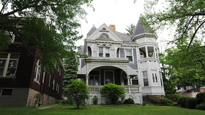 This Queen Anne-style home at 1425 Brownsville Road in Carrick is on the market for $109,900. The apartment building on the left sold in 2008 for $125,000.