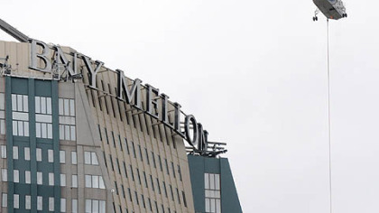 The BNY Mellon sign goes up last October.