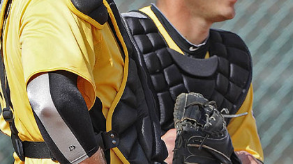 Catchers Chris Snyder, left, and Tony Sanchez look on at spring training in February in Bradenton, Fla.