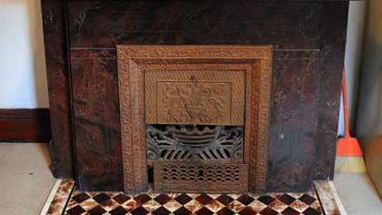 An upper-floor fireplace.