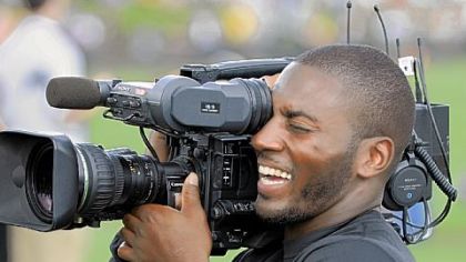 The Steelers' Ryan Clark takes his turn behind the camera during training camp Wednesday.
