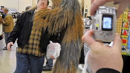 Dan Kellaway of Arnold has his picture taken with Chewbacca by his friend Andrew Gardone at the Pittsburgh Comicon.