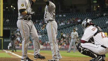 The Pirates' Garrett Jones, left, receives a high five from teammate Andrew McCutchen after hitting a three-run home run in the first inning against the Astros at Minute Maid Park in Houston Thursday.