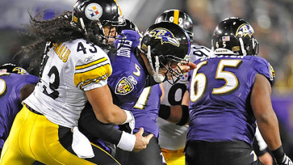 Troy Polamalu strips the ball from Ravens QB Joe Flacco, setting up the go-ahead TD late in a 13-10 victory Dec. 5 -- a win that ultimately decided the division.