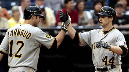 Pirates infielder Chase d'Arnaud and outfielder Alex Presley.