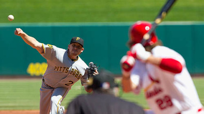 Pirates pitcher Kevin Correia throws against the the Cardinals' Chris Carpenter at Busch Stadium in St. Louis Wednesday.