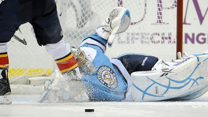 Penguins goalie Marc-Andre Fleury makes save against the Panthers in the shootout.