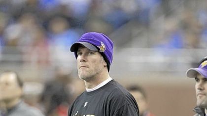 Brett Favre watches the final game of his career from the sideline Sunday.