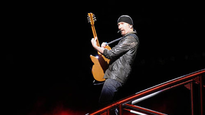 The Edge performs "Mysteriuos Ways" during U2's 360 World Tour at Heinz Field.
