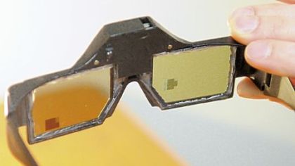 In this series, the shifting pixel areas on the lenses of the Dynamic Eye glasses show how the frames' processing system responds to changes in the direction of glare.