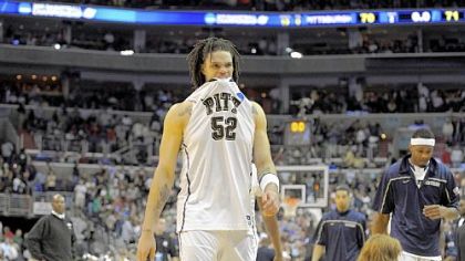 Pitt's Gary McGhee walks off the court after losing to Butler last night in the third round of the NCAA tournament in Washington, DC.