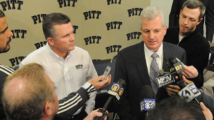 Pitt football head coach Todd Graham, left, and athletic director Steve Pederson talk to media Wednesday.